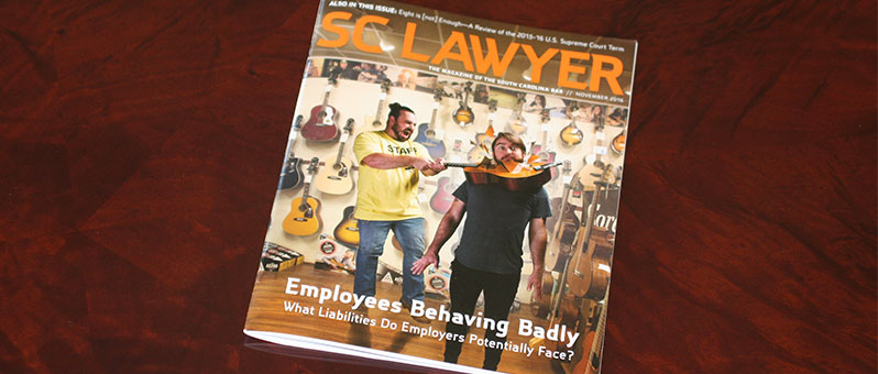 photo of cover of SC Lawyer magazine with image of one employee breaking a guitar over a man's head for employer liability article