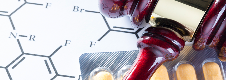 chemical compound diagram, pills and gavel composition